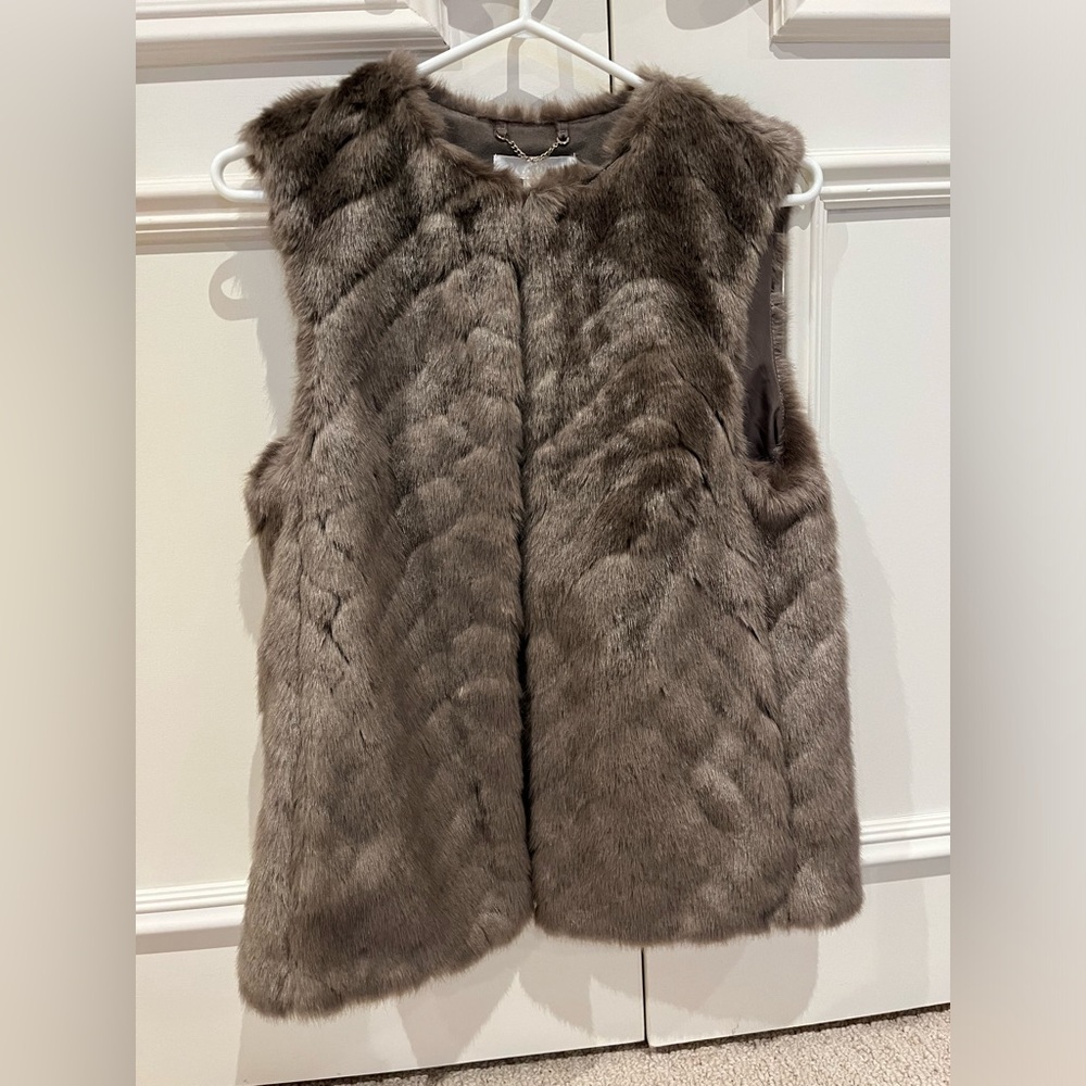New Fur vest . Great over a sweater